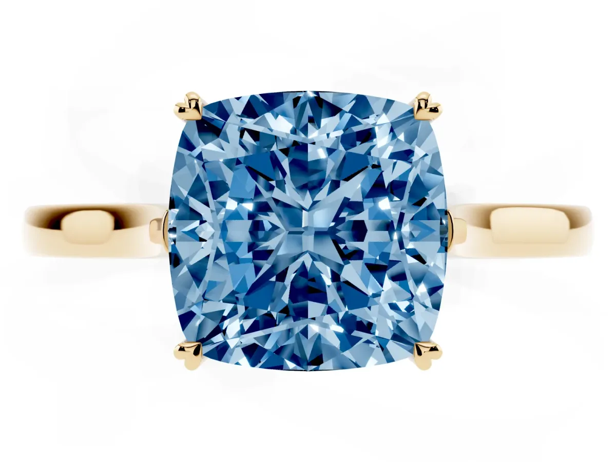 Fancy Blue Cushion Cut Solitaire Heart Prong Engagement Ring with Tapered Band Yellow gold