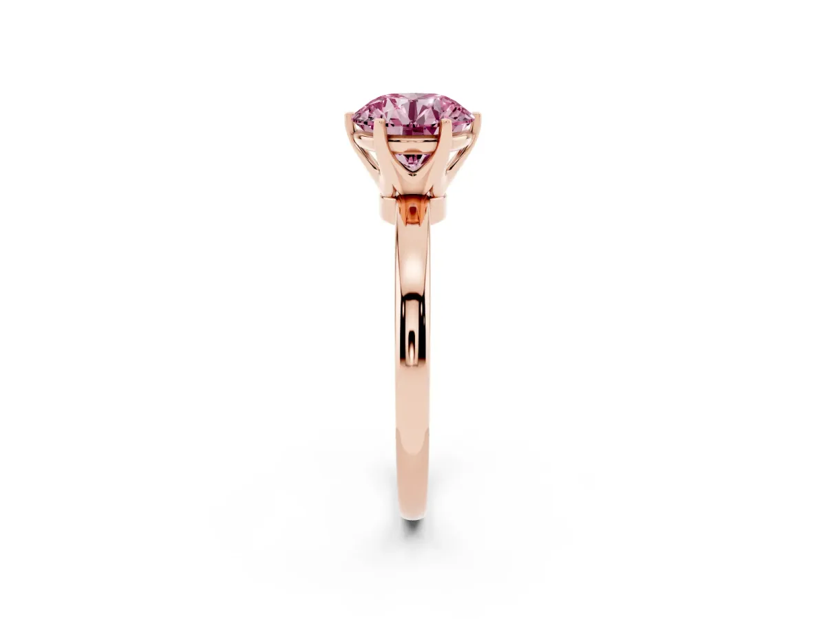 Fancy Pink Round Cut Solitaire Diamond Ring with Six-Prong Setting on a Classic Band Rose gold