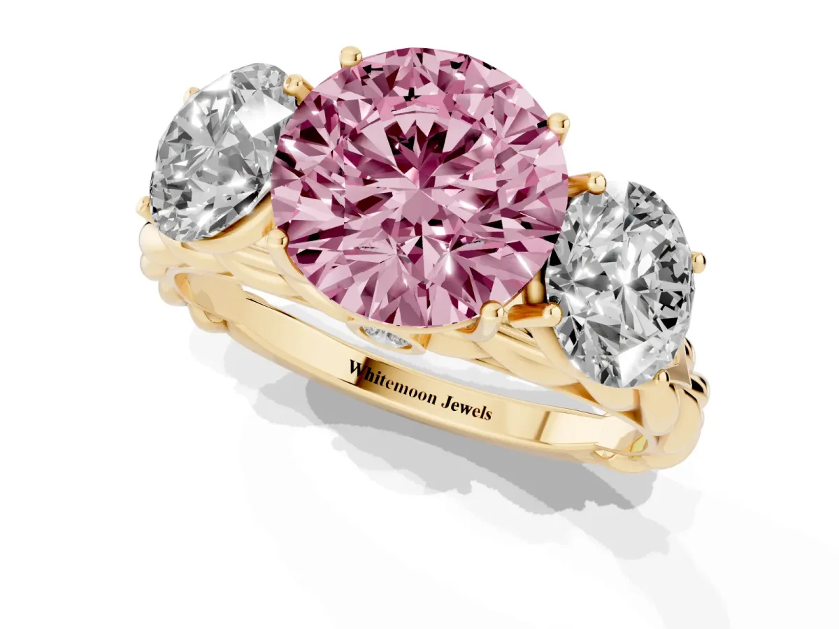 Fancy Pink Three-Stone Round Cut Diamond Braided Band Ring with Four-Prong Setting Yellow gold