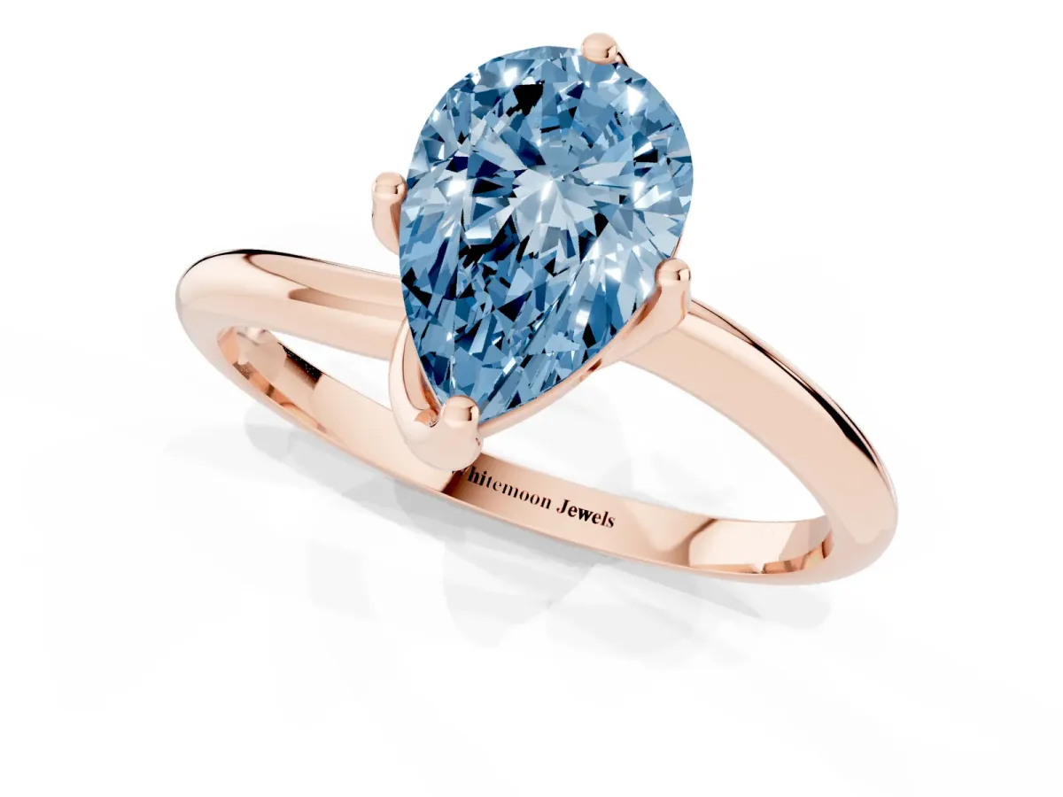 Fancy Blue Pear Cut Diamond Solitaire Engagement Ring with Four-Prong Setting and Classic Band Rose gold