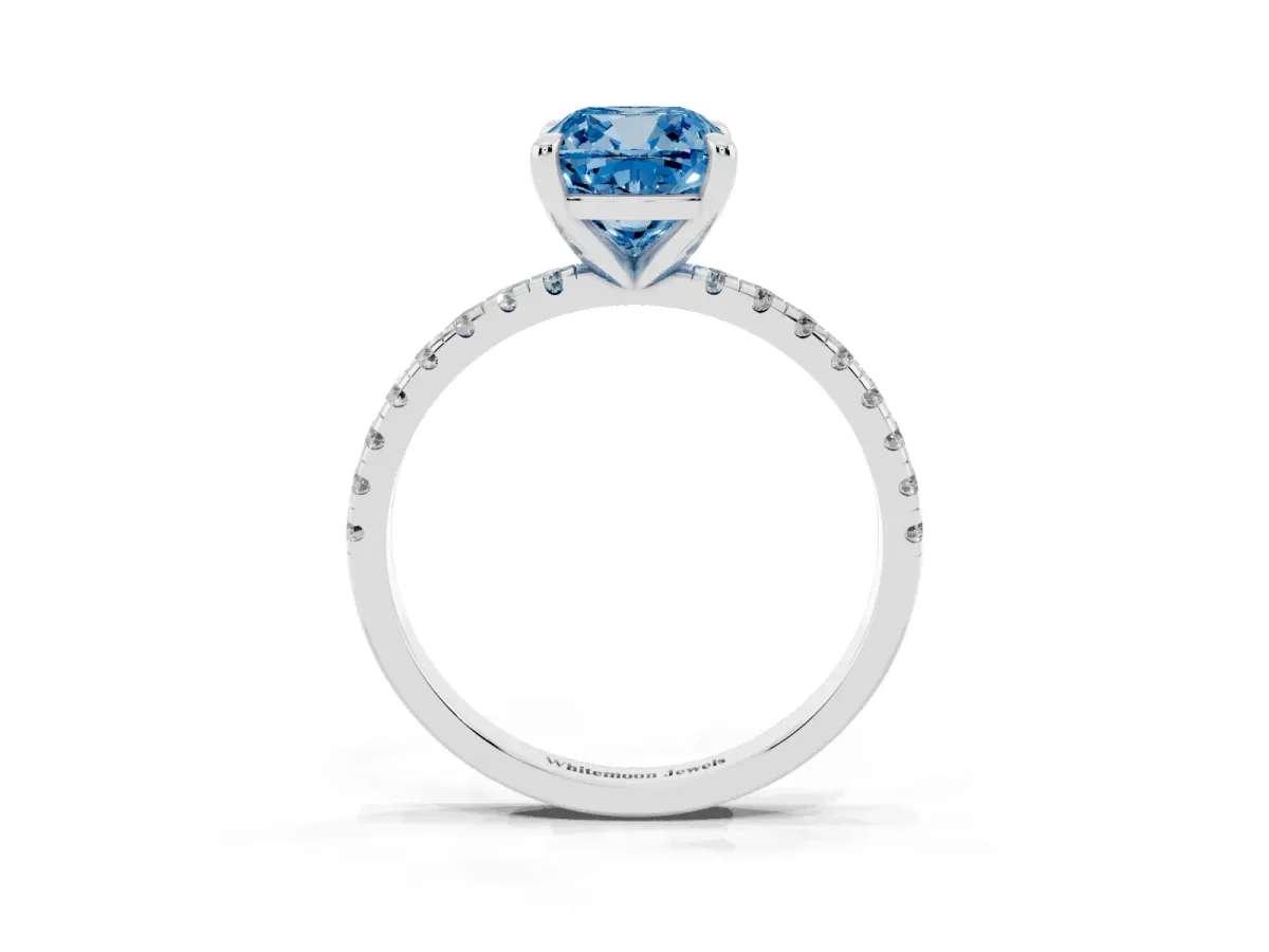 Fancy Blue Cushion Cut Diamond Brilliant Solitaire Ring with Pavé Band and Four-Prong Setting Silver