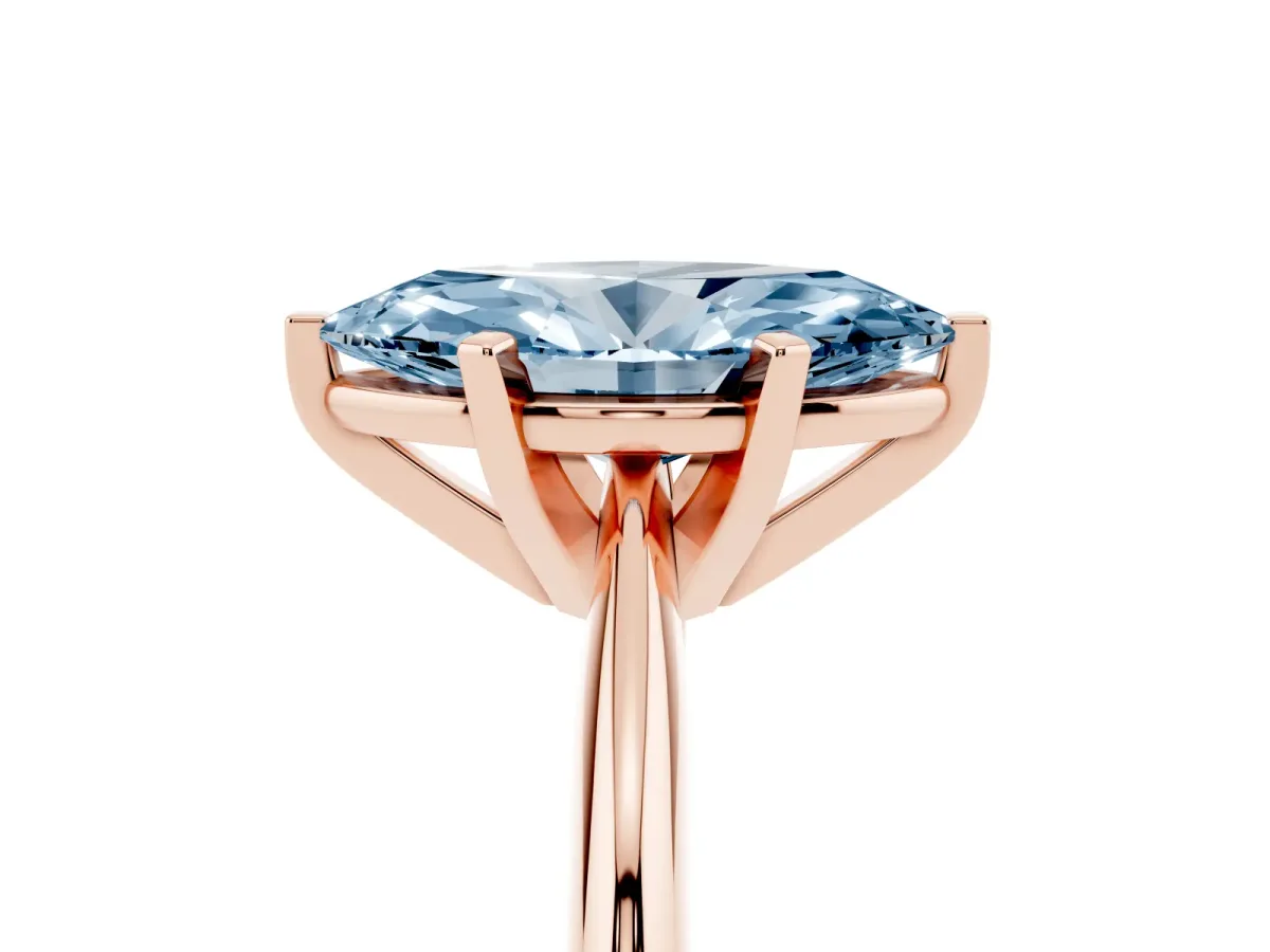 Fancy Blue Marquise Cut Cut Solitaire Ring with Four-Prong Setting on a Classic Band Rose gold