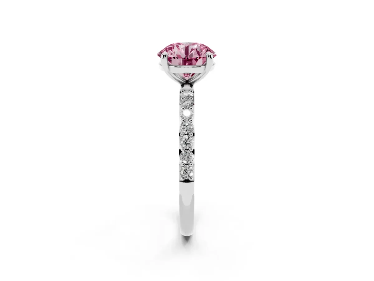 Fancy Pink Round Cut Diamond Solitaire Ring with Round Pavé Band and Prong Setting Silver