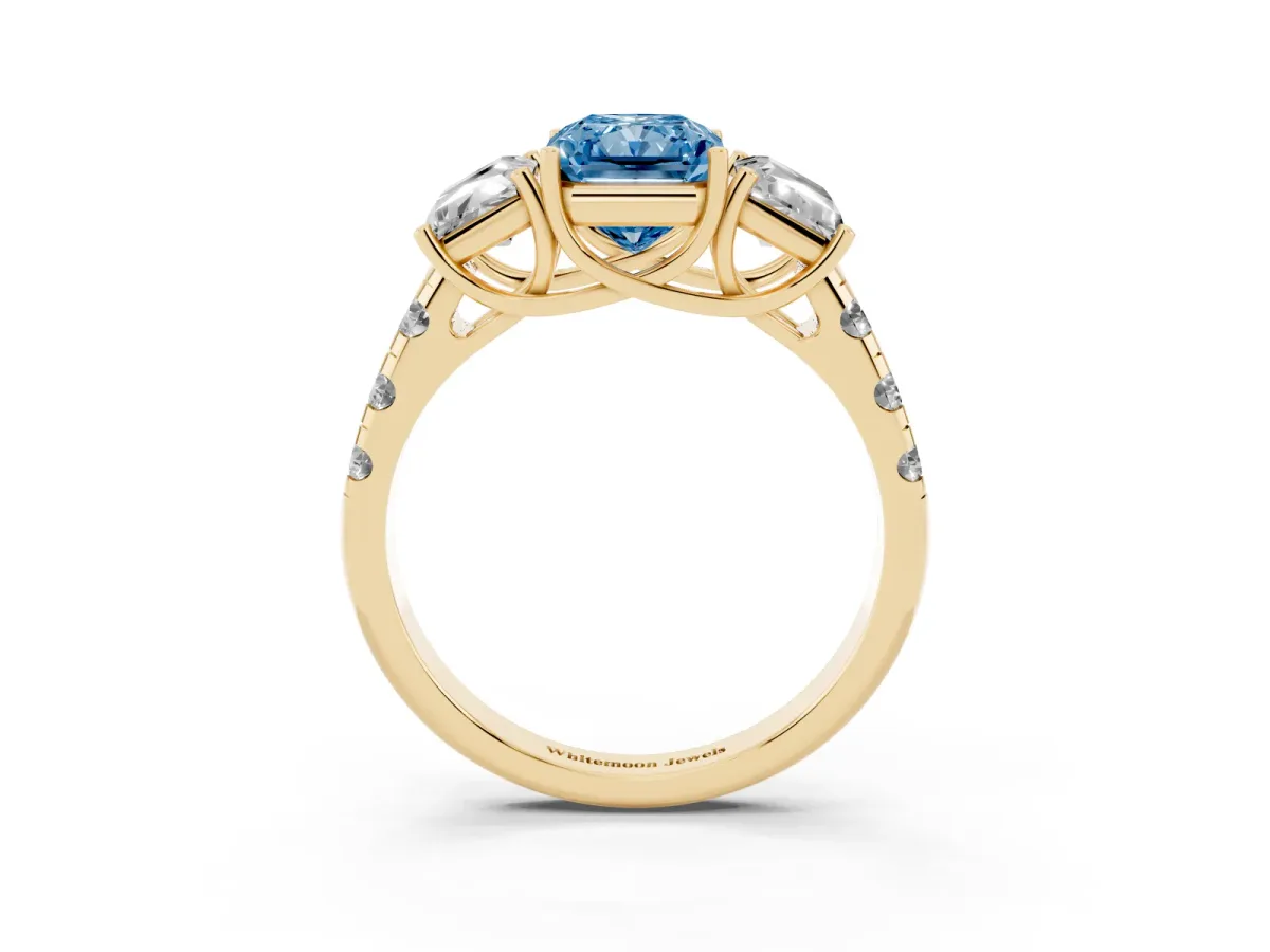 Fancy Blue Three-Stone Radiant Cut Diamond Pavé Band with Prong Setting Yellow gold