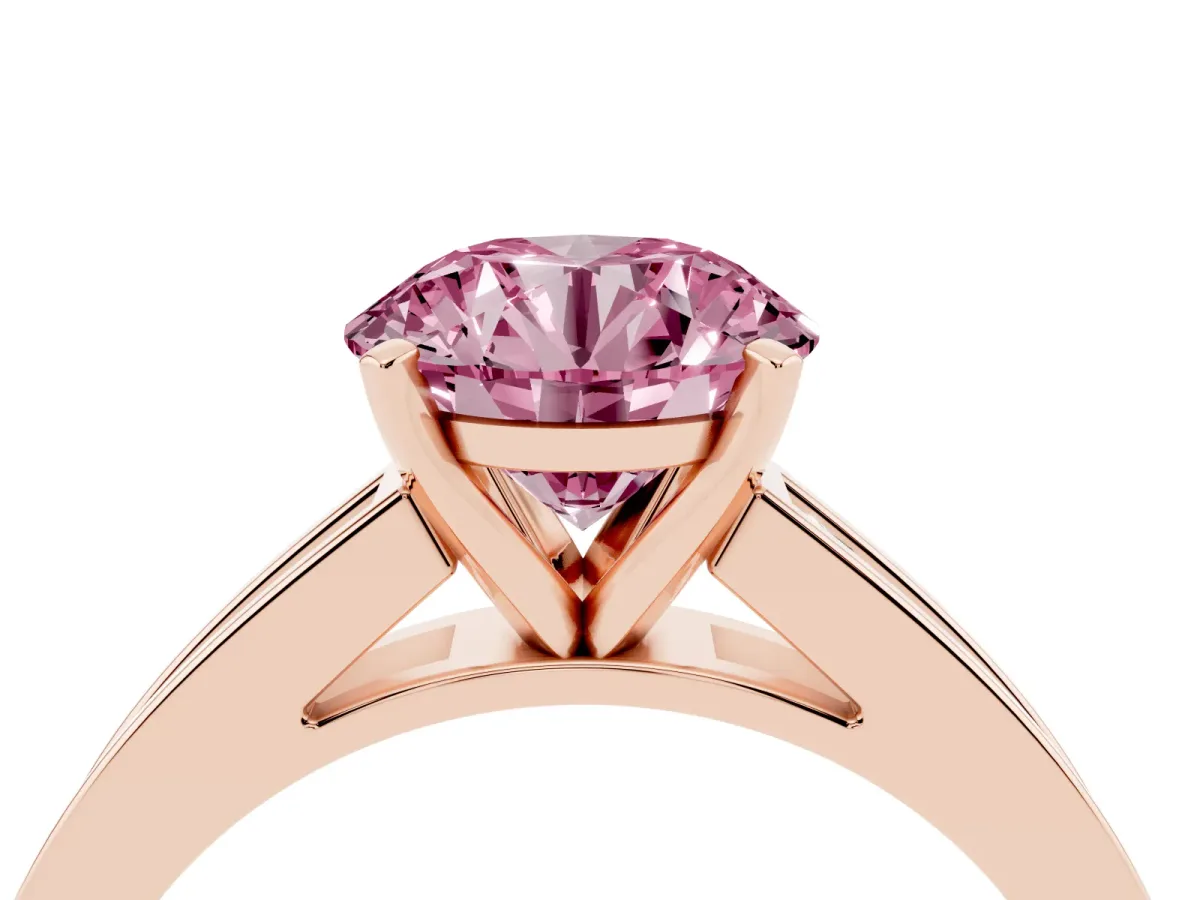 Fancy Pink Round Cut Solitaire Diamond Ring with Channel-Set Band and Four-Prong Setting Rose gold