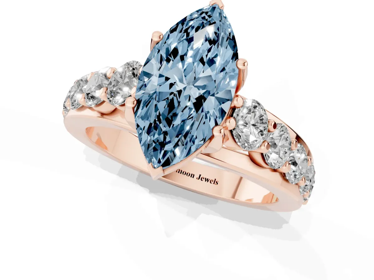 Fancy Blue Marquise Cut Diamond Engagement Ring with Pavé Band and Four-Prong Setting Rose gold
