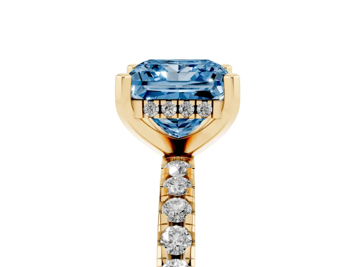 Fancy Blue Princess Cut Diamond Solitaire Ring with Round Pavé Band and Four-Prong Setting Yellow gold