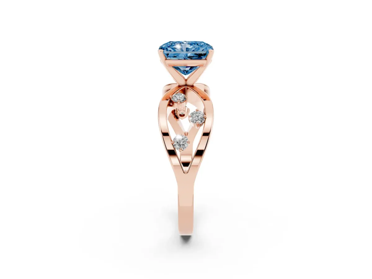 Fancy Blue Radiant Cut Cut Solitaire Diamond with Side Stones on Criss-Cross Band and Four-Prong Setting Rose gold