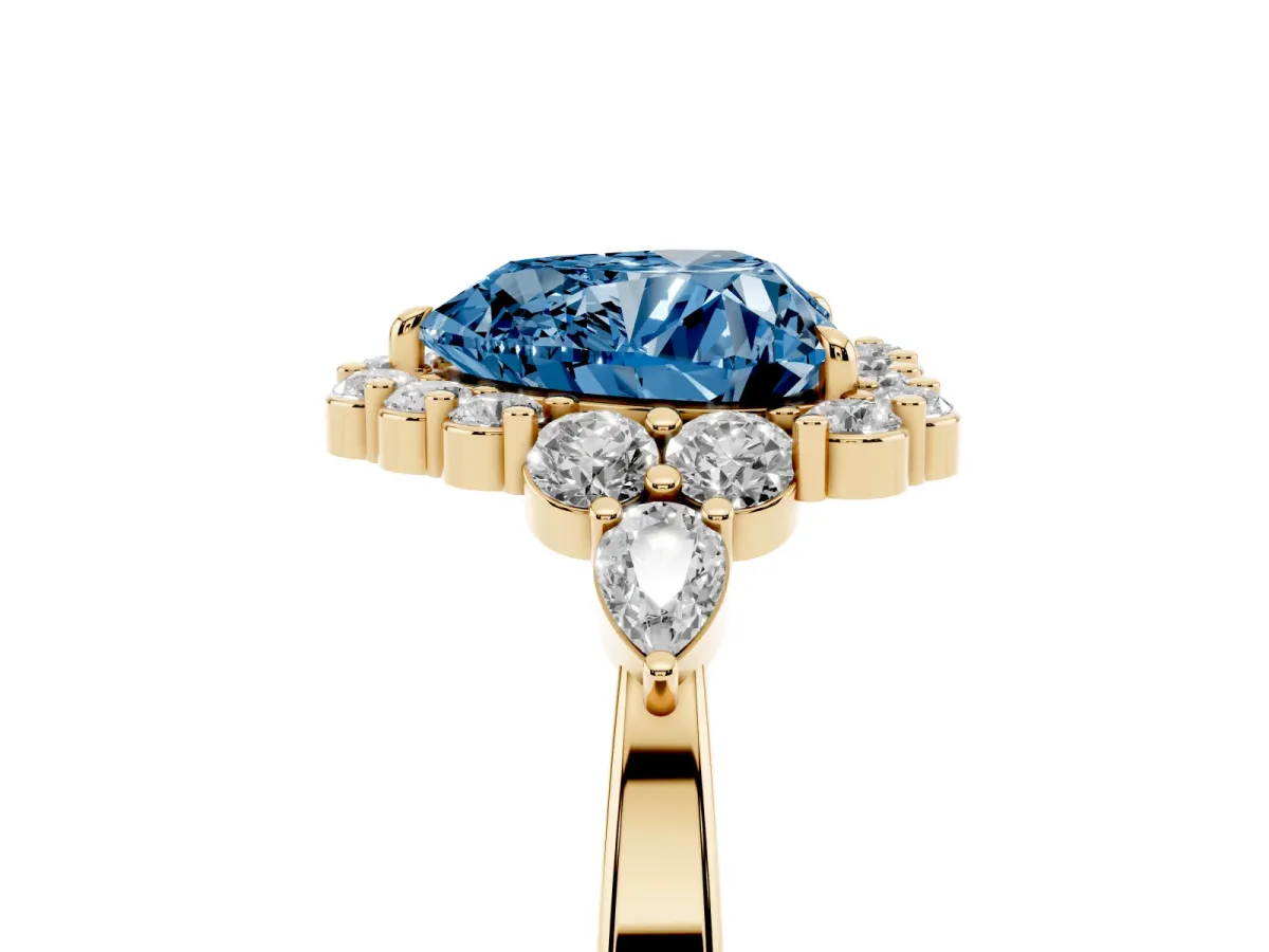 Fancy Blue Heart Cut Diamond Halo Ring with Pear Side Stones and Prong Setting Yellow gold