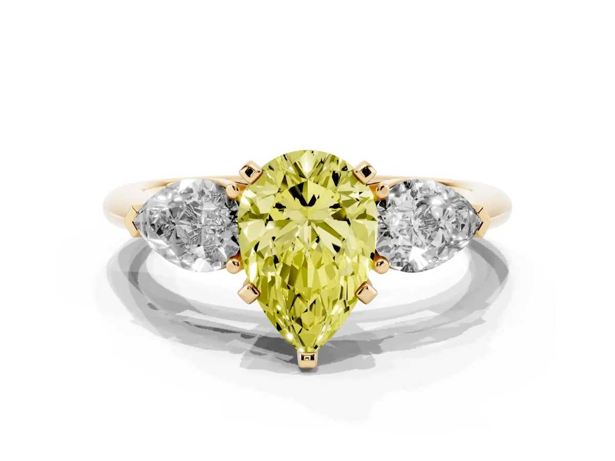 Fancy Yellow Three-Stone Pear Cut Diamond Ring with Pear Side Stones and Four-Prong Setting Yellow gold