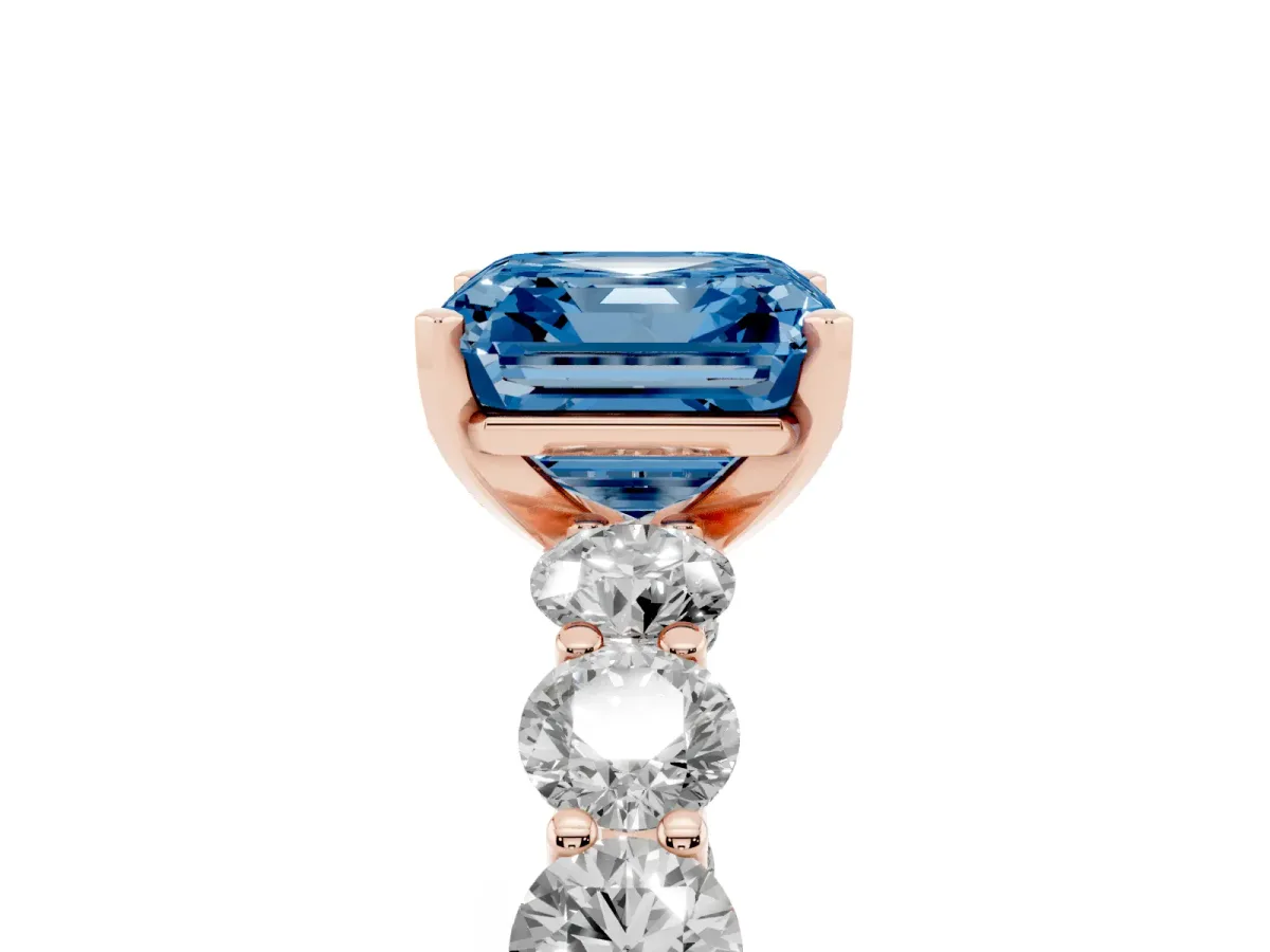 Fancy Blue Asscher Cut Diamond Prong Setting with Side Stones on a Pave Band Rose gold