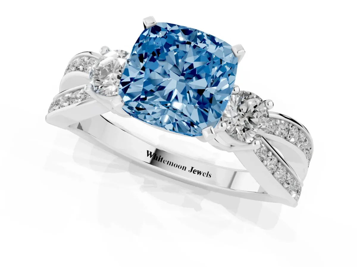 Fancy Blue Three-Stone Cushion Cut Cut Diamond Twist Band with Prong Setting Silver