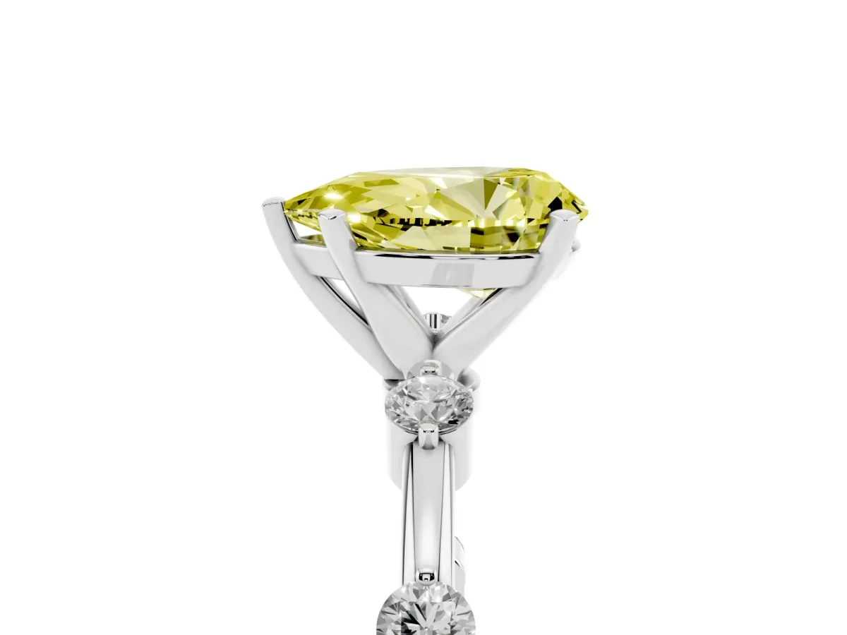 Fancy Yellow Pear Cut Solitaire Diamond Ring with Bezel Set Side Stones and Prong Setting Platinum