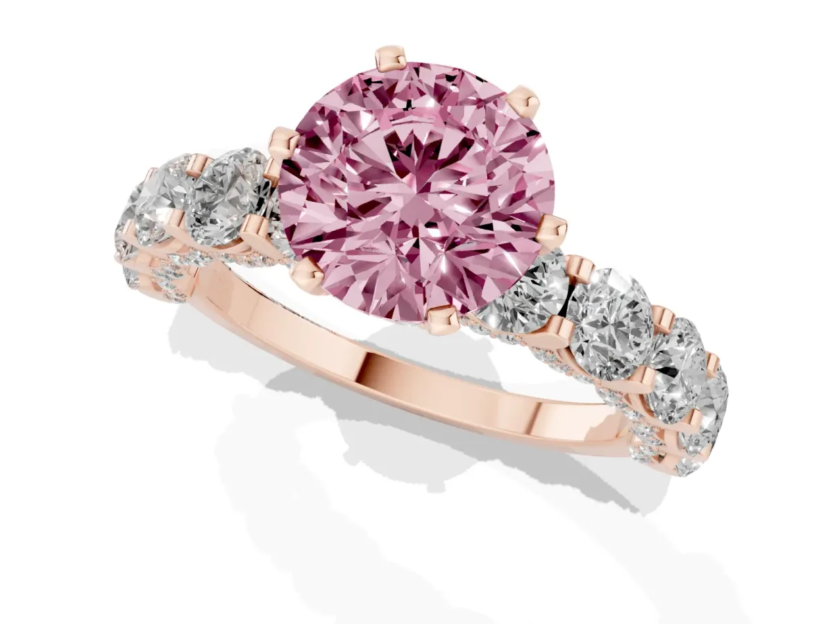 Fancy Pink Round Cut Diamond Side Stone Engagement Ring with Four-Prong Setting Rose gold