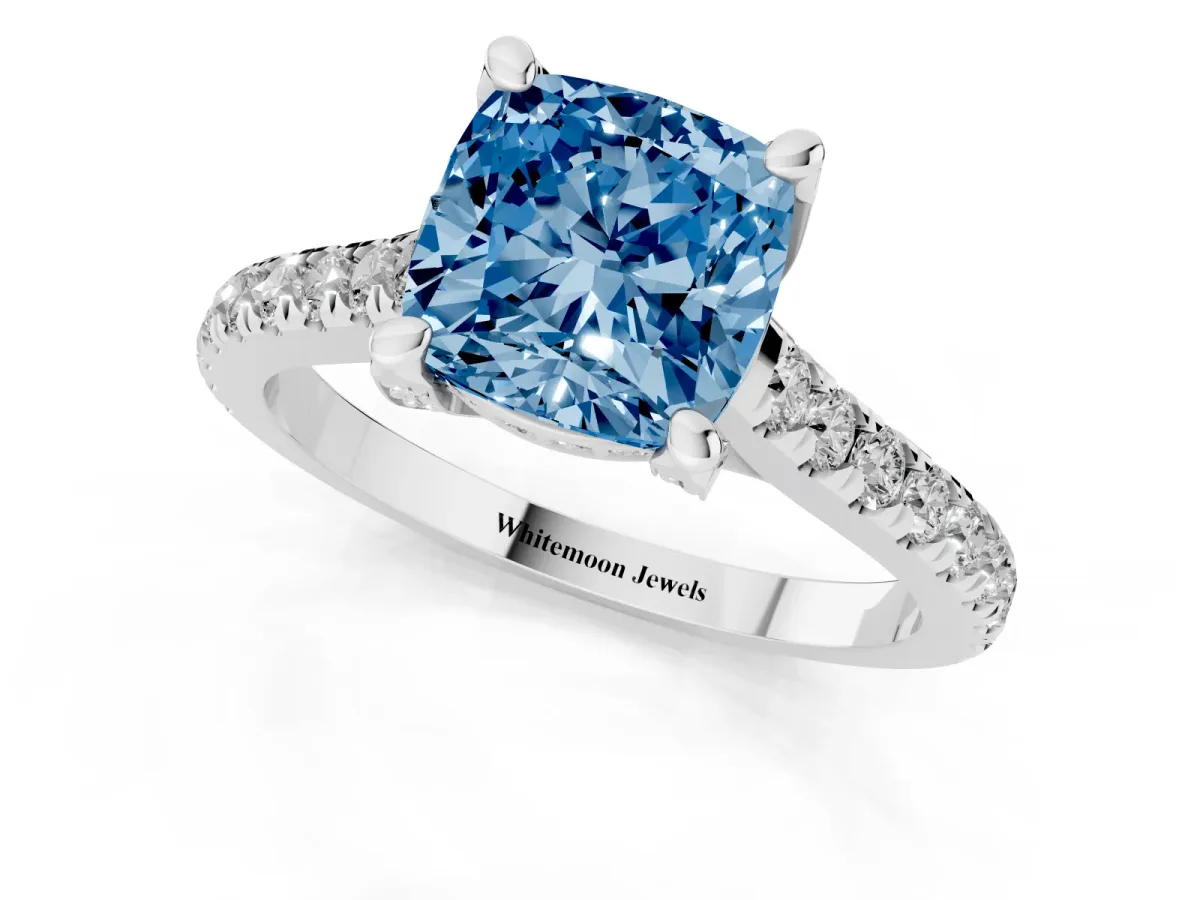 Fancy Blue Cushion Cut Brilliant Diamond Solitaire with Pavé Band and Four-Prong Setting Platinum