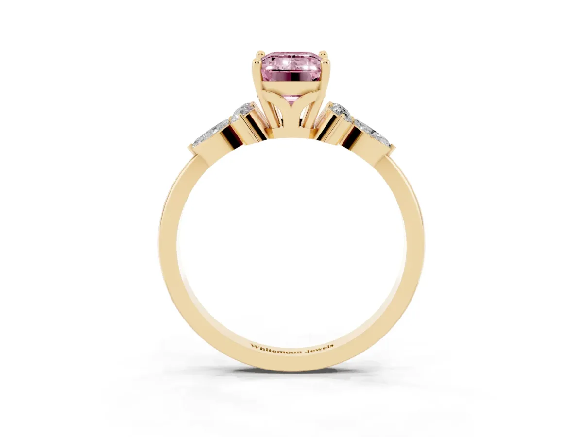 Fancy Pink Emerald Cut Brilliant Diamond Solitaire Ring with Pear Side Stones and Four-Prong Setting Yellow gold