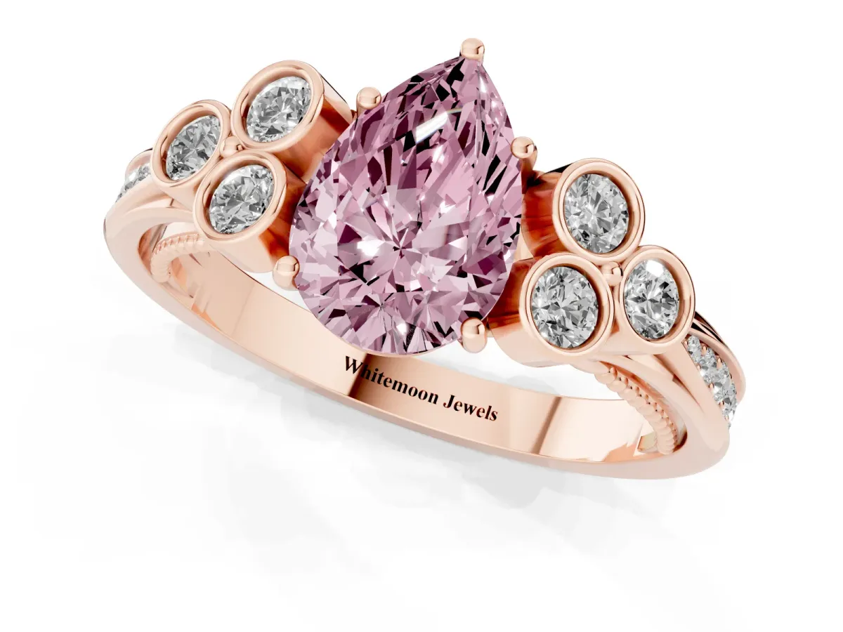 Fancy Pink Pear Cut Cut Diamond Engagement Ring with Bezel Set Round Side Stones and Prong Setting Rose gold