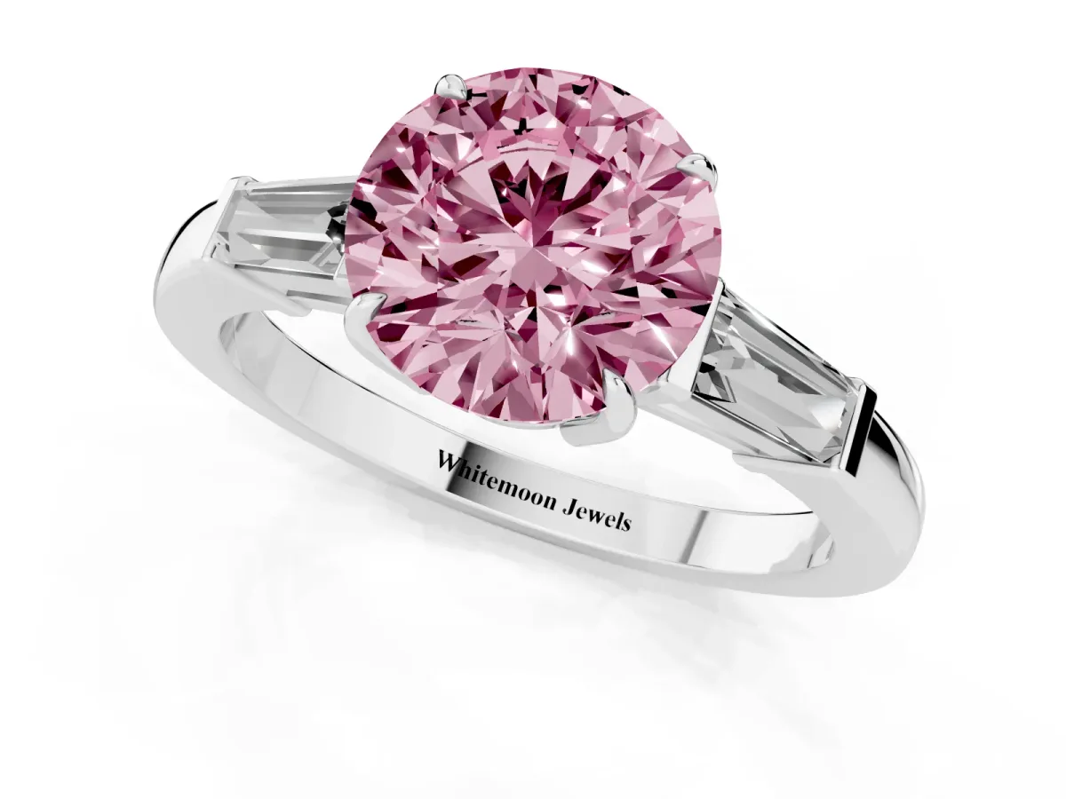 Fancy Pink Round Cut Diamond Three-Stone Ring with Tapered Baguette Side Stones and Prong Setting White gold