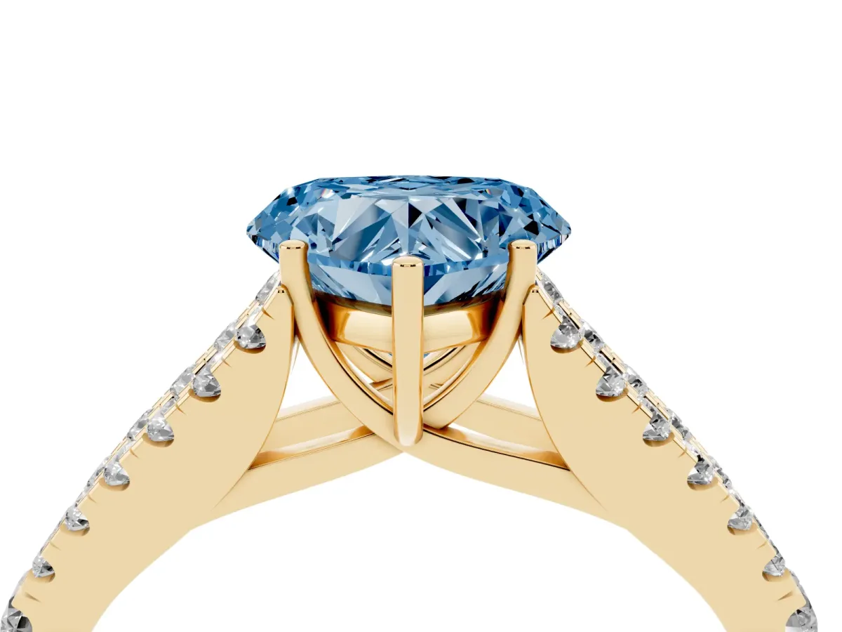 Fancy Blue Heart Cut Diamond Split Shank Pavé Engagement Ring with Four-Prong Setting Yellow gold
