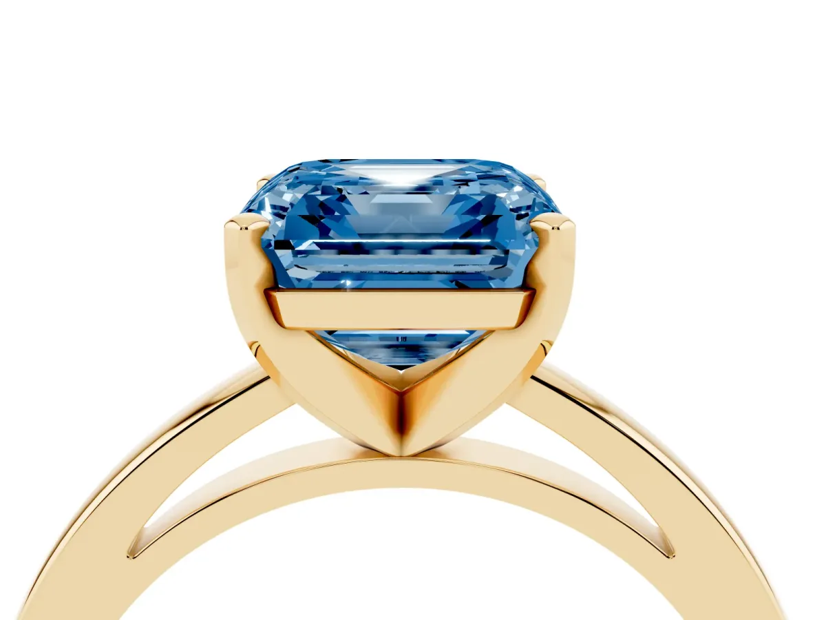 Fancy Blue Asscher Cut Solitaire Diamond Engagement Ring with Four-Prong Setting on a Classic Band Yellow gold