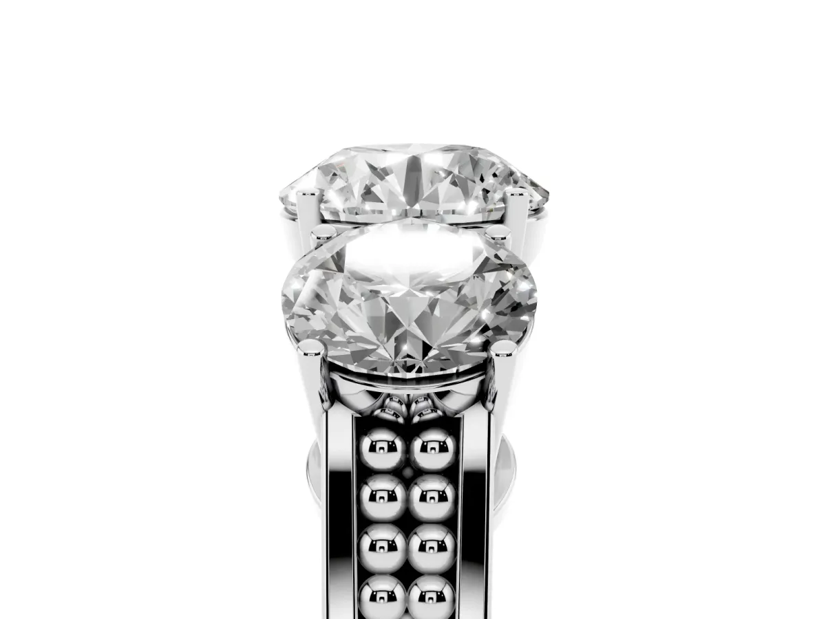 Round Cut Diamond Three-Stone Ring with Prong Setting and Textured Band Silver