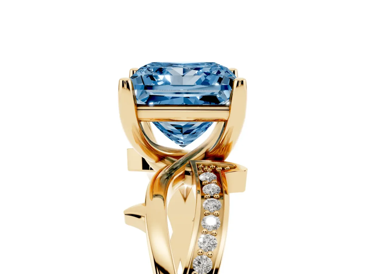 Fancy Blue Princess Cut Solitaire Twist Band with Pavé Accents and Four-Prong Setting Yellow gold