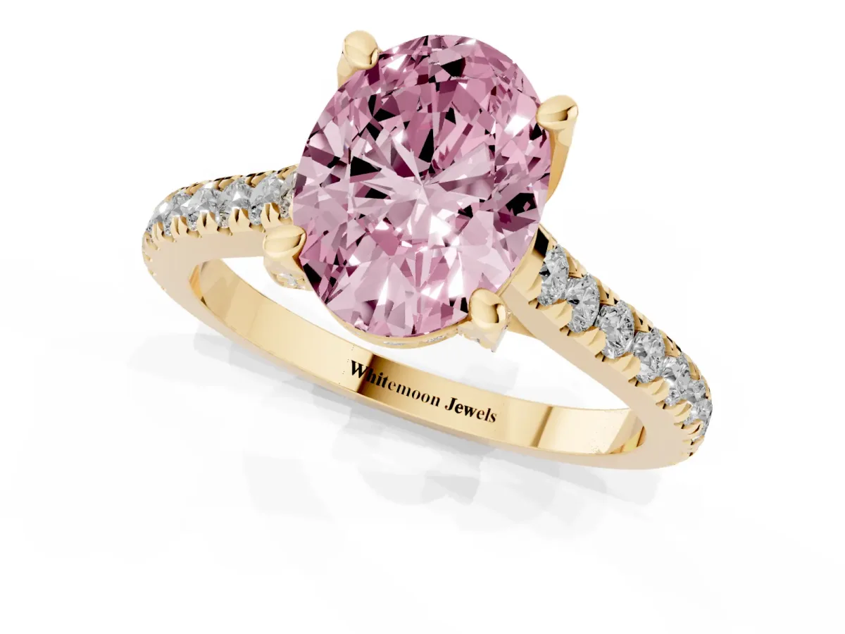 Fancy Pink Oval Cut Brilliant Diamond Solitaire with Pavé Band and Four-Prong Setting Yellow gold