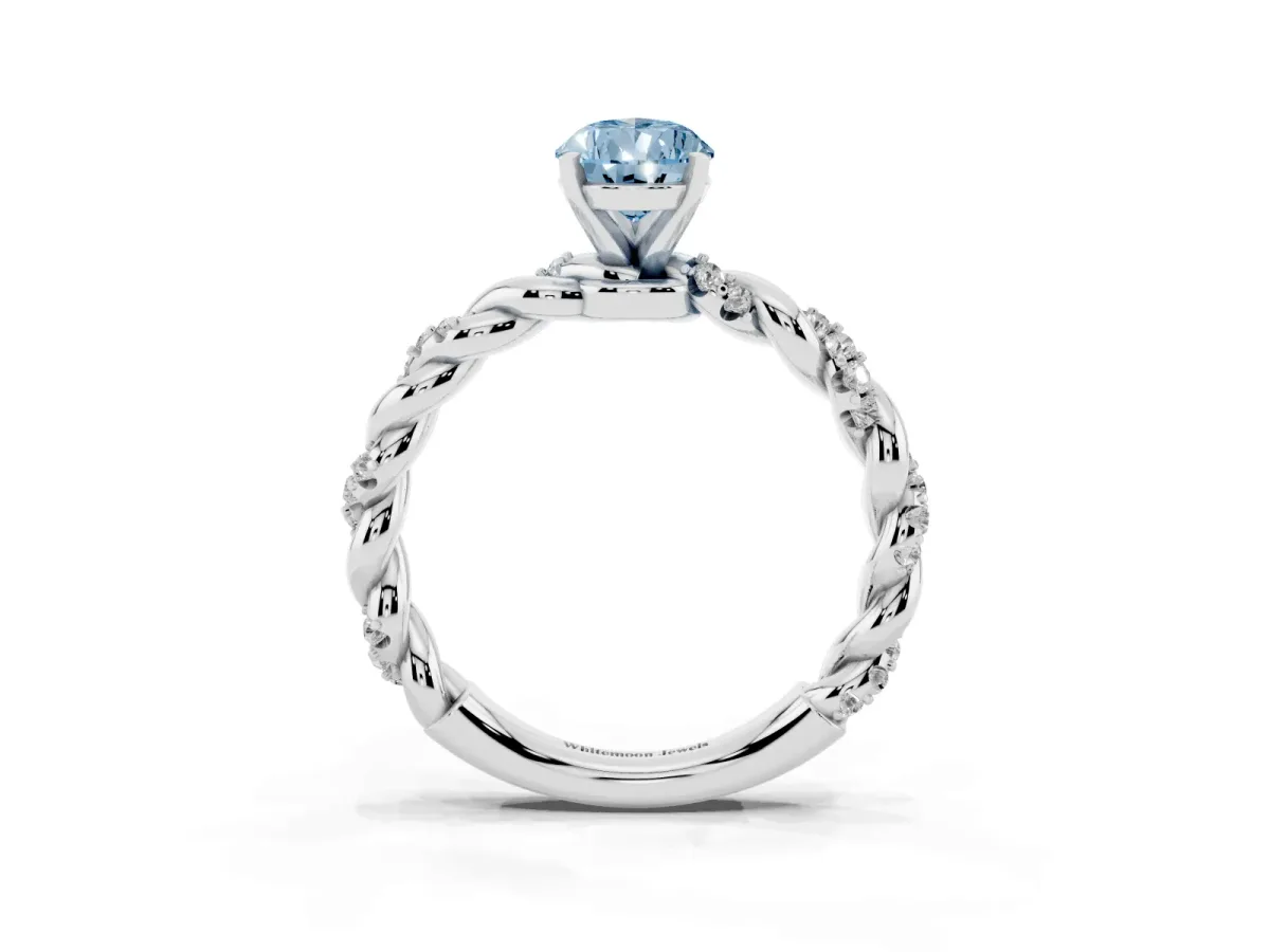Fancy Blue Pear Cut Diamond Solitaire Ring with Twisted Band and Pavé Accents Silver
