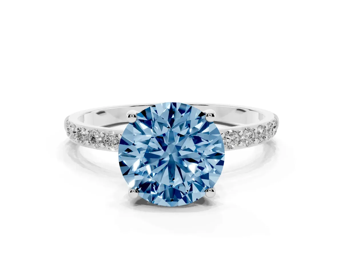 Fancy Blue Round Cut Diamond Solitaire Ring with Round Pavé Shoulders and Prong Setting Silver