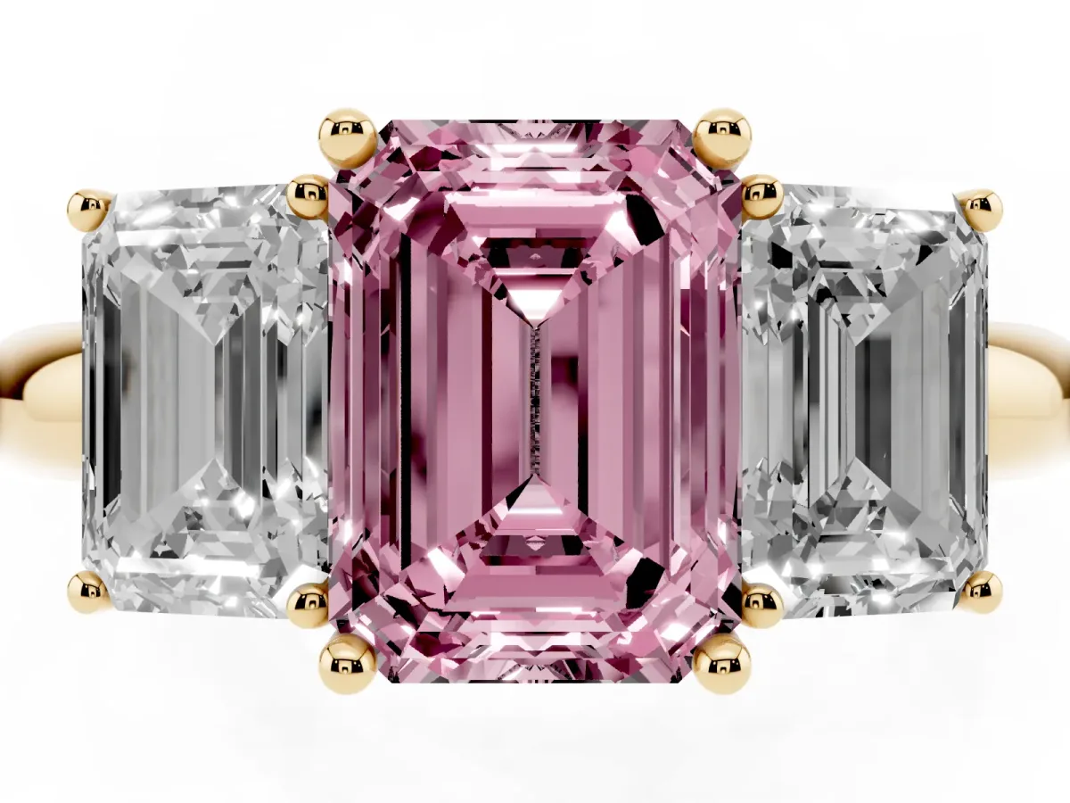 Fancy Pink Three-Stone Emerald Cut Cut Diamond Engagement Ring with Prong Setting on a White Gold Band Yellow gold