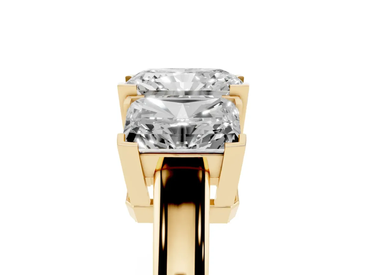 Three-Stone Radiant Cut Cut Diamond Ring with Channel Set Band and Four-Prong Setting Yellow gold