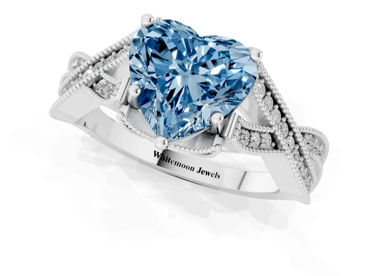 Fancy Blue Heart Cut Cut Diamond Twisted Band with Milgrain Pave Setting and Four-Prong Setting Silver