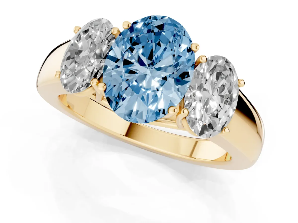 Fancy Blue Three-Stone Oval Cut Cut Diamond Ring with Prong Setting and Classic Band Yellow gold
