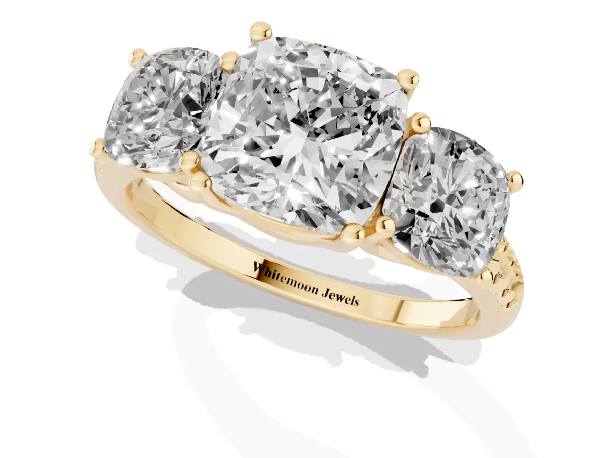 Three-Stone Cushion Cut Diamond Ring with Round Pavé Band and Prong Setting Yellow gold