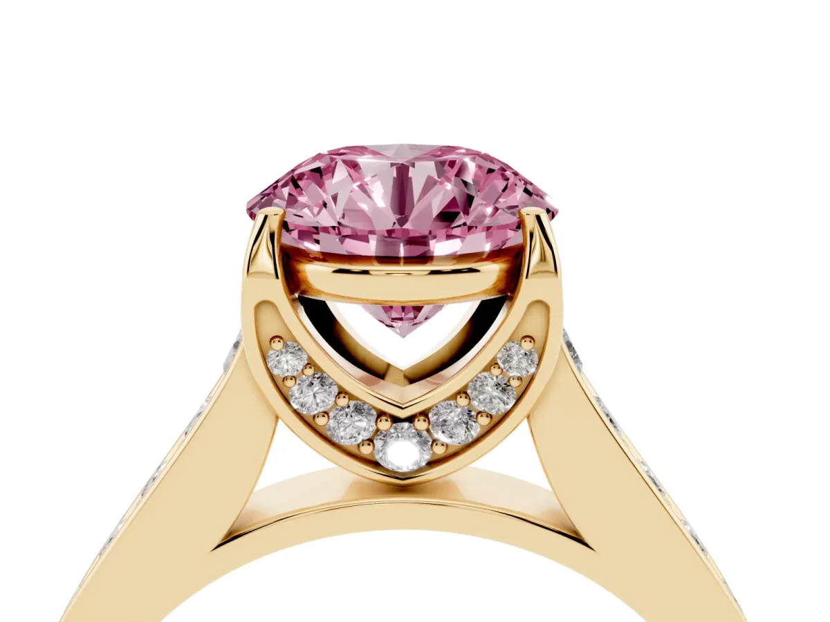Fancy Pink Round Cut Brilliant Cut Diamond Engagement Ring with Pavé Band and Four-Prong Setting Yellow gold