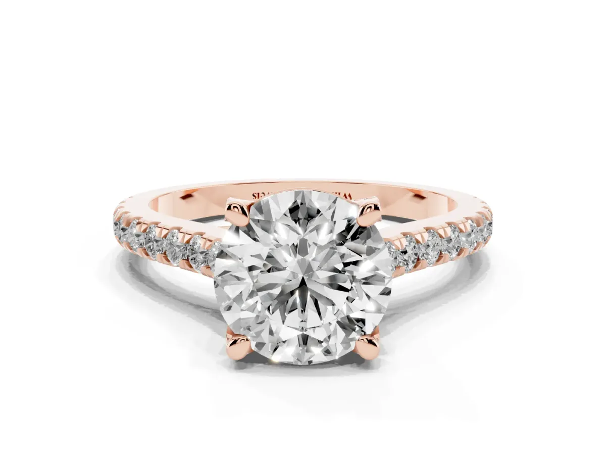 Round Cut Brilliant Diamond Solitaire with Pavé Band and Four-Prong Setting Rose gold