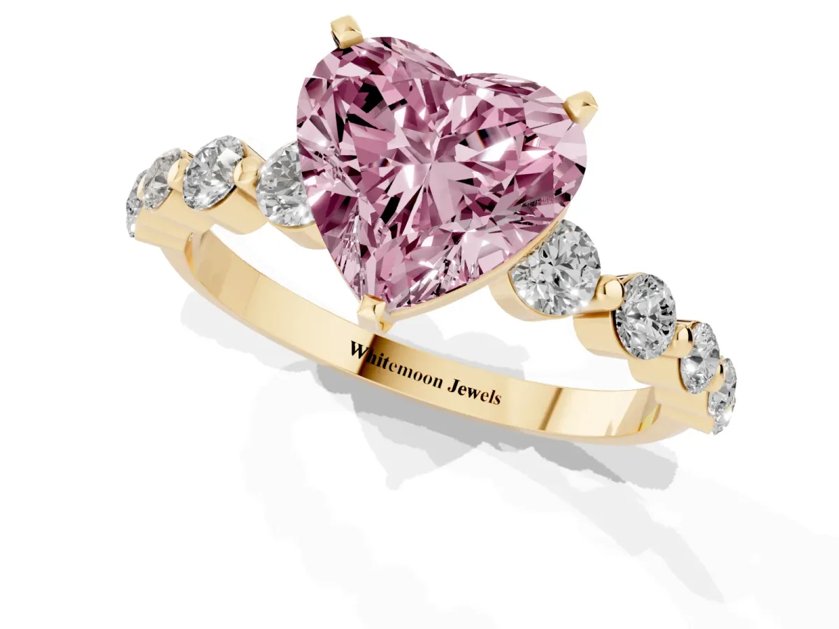 Fancy Pink Heart Cut Solitaire Diamond Ring with Pave Band and Four-Prong Setting Yellow gold