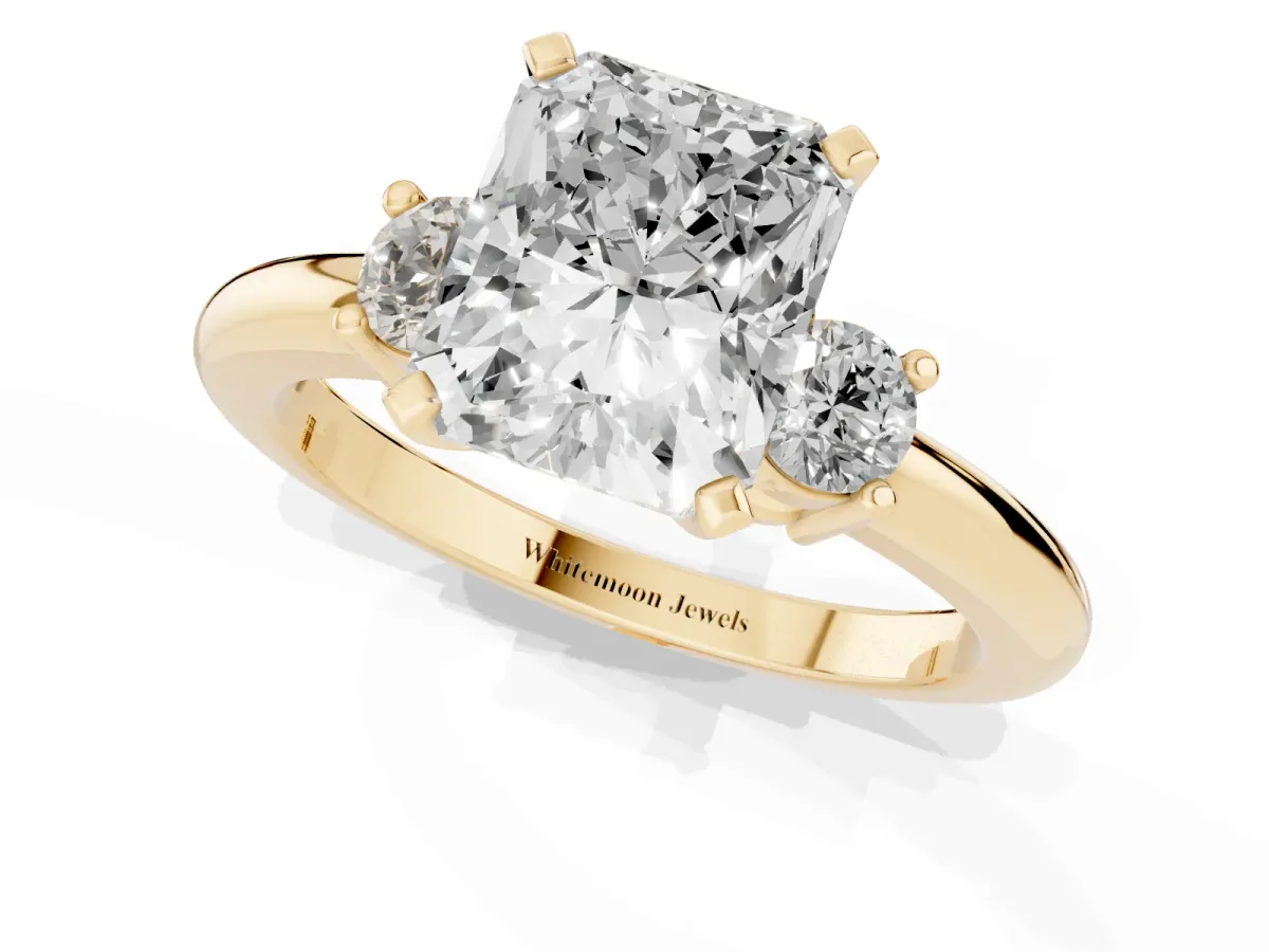 Three-Stone Radiant Cut Cut Diamond Solitaire with Prong Setting and Classic Band Yellow gold