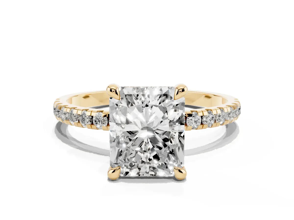 Radiant Cut Diamond Brilliant Solitaire Ring with Pavé Band and Four-Prong Setting Yellow gold
