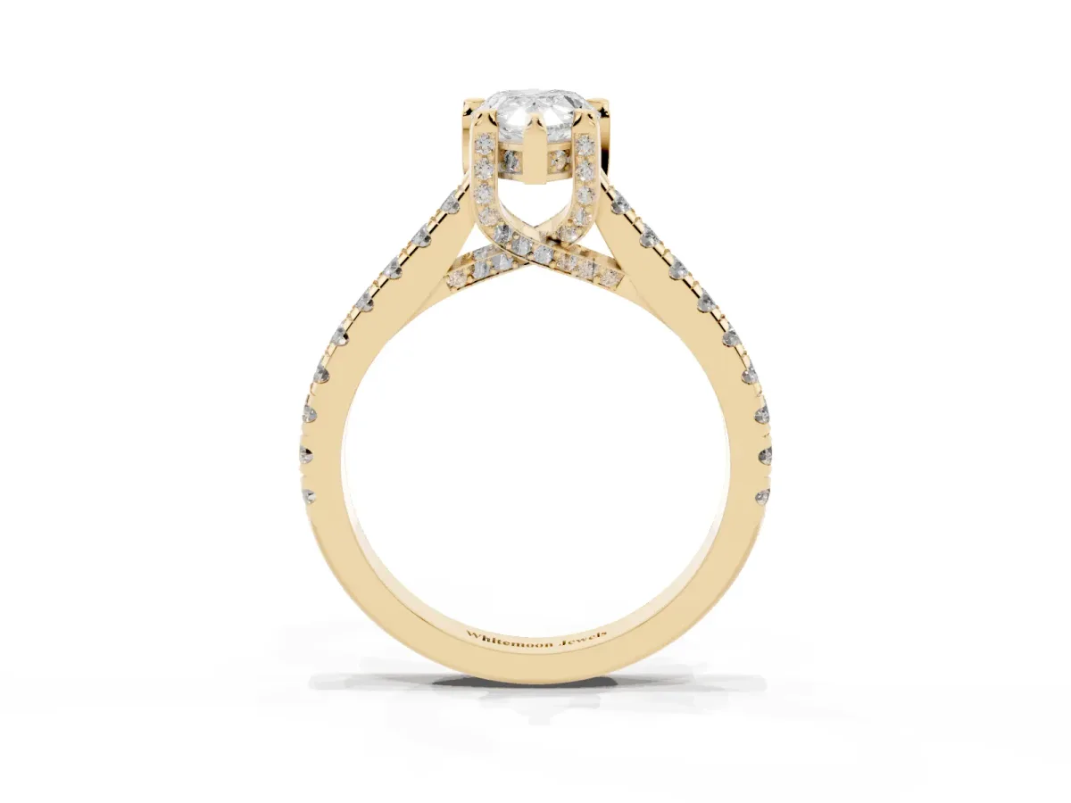 Pear Cut Brilliant Diamond Solitaire with Pavé Band and Four-Prong Setting Yellow gold