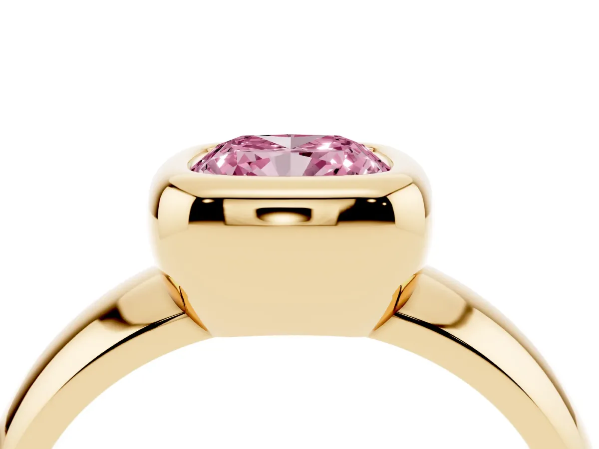 Fancy Pink Bezel Set Cushion Cut Solitaire Ring with Wide Band Yellow gold