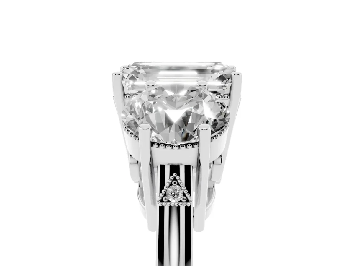 Three-Stone Emerald Cut Diamond Engagement Ring with Prong Setting on a Classic Band Platinum