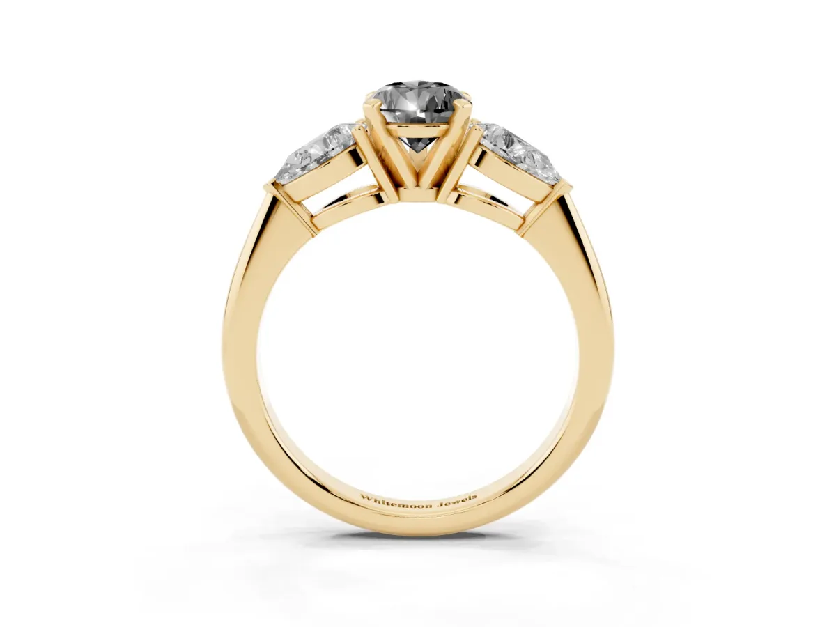 Fancy Black Three-Stone Pear Cut Diamond Ring with Pear Side Stones and Four-Prong Setting Yellow gold