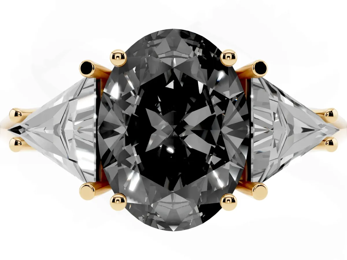 Fancy Black Three-Stone Oval Cut Diamond Engagement Ring with Trillion Side Stones and Prong Setting Yellow gold