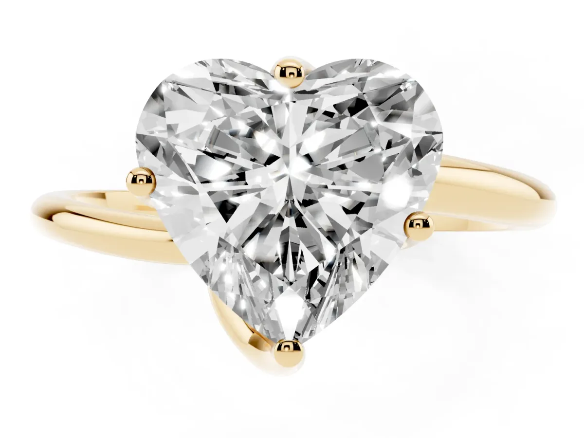 Heart Cut Diamond Solitaire Engagement Ring with Four-Prong Setting and Classic Band Yellow gold