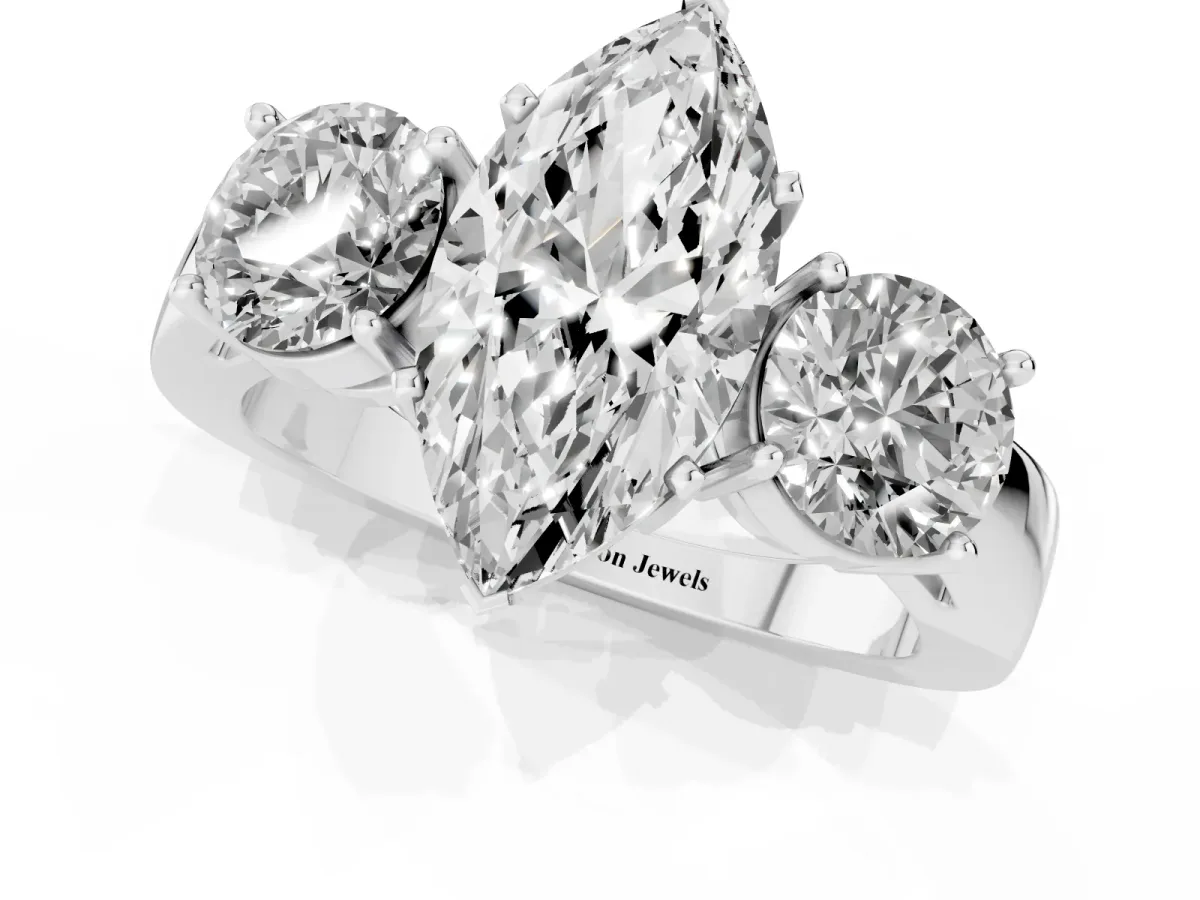 Three-Stone Marquise Cut Diamond Ring with Round Side Stones, Classic Band, and Four-Prong Setting Silver