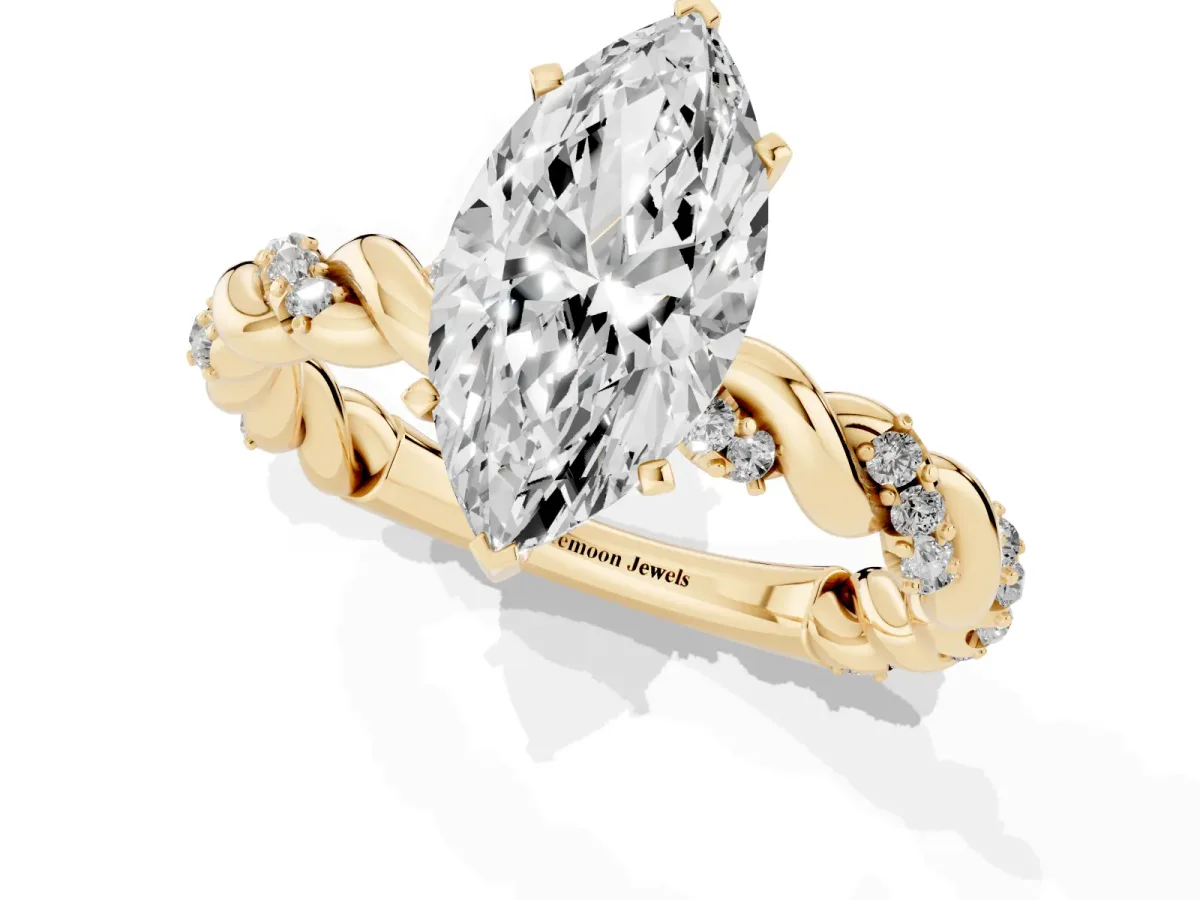 Marquise Cut Diamond Solitaire Ring with Twisted Band and Pavé Accents Yellow gold
