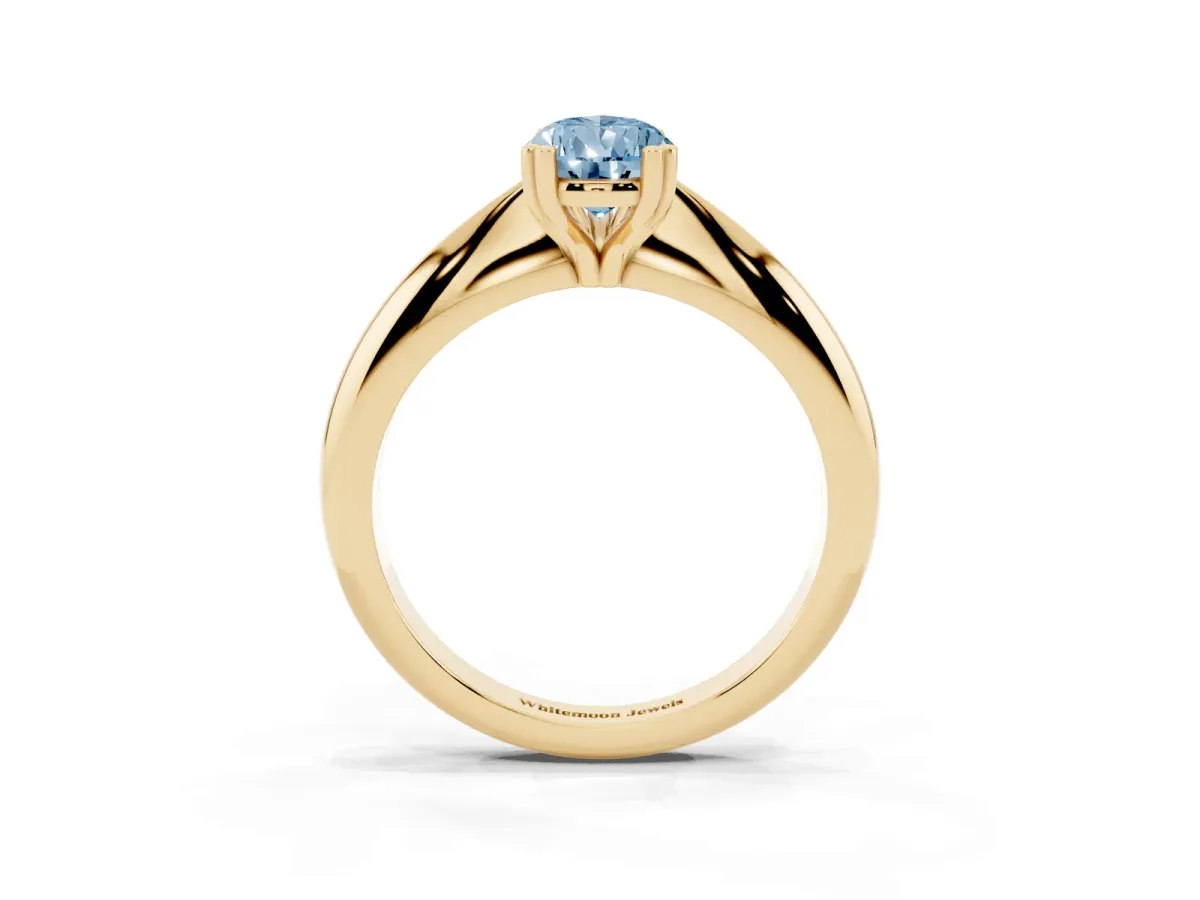 Fancy Blue Pear Cut Cut Solitaire Engagement Ring with Tapered Band and Four-Prong Setting Yellow gold