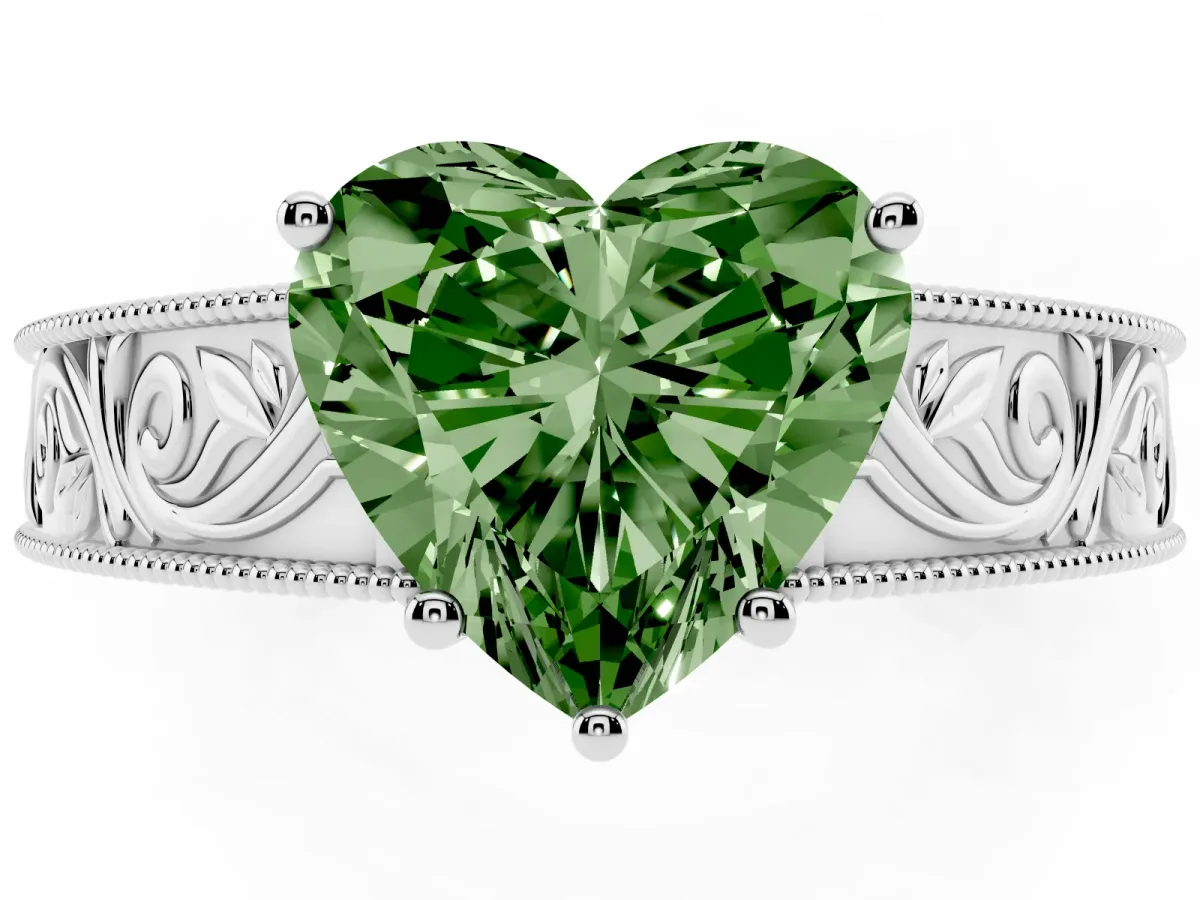 Fancy Green Heart Cut Diamond Solitaire Ring with Engraved Band and Four-Prong Setting Silver