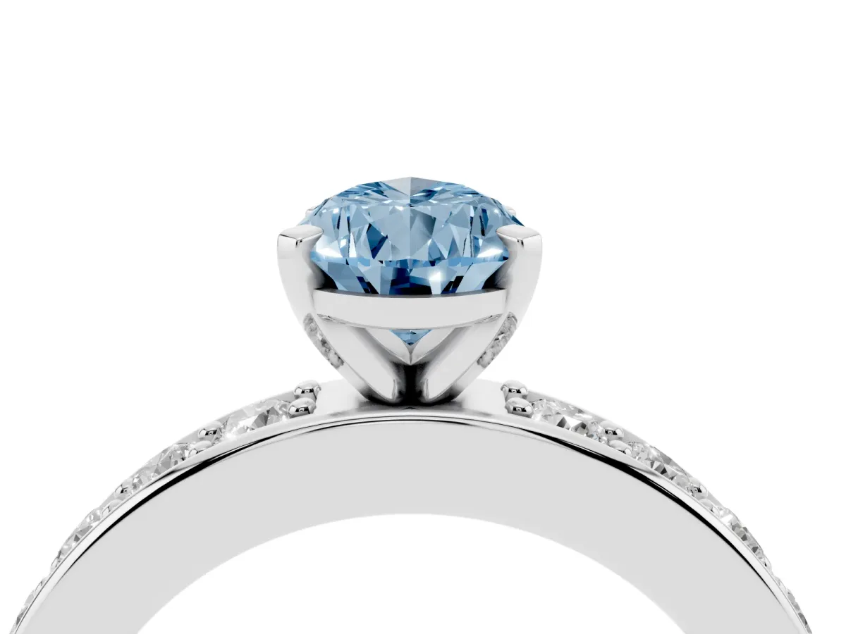 Fancy Blue Pear Cut Diamond Engagement Ring with Channel Set Round Band and Prong Setting Silver